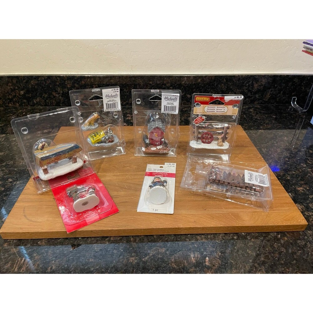 7 piece miniature Christmas village pieces
